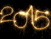 New Year 2015 formed from sparking digits over black background