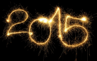 New Year 2015 formed from sparking digits over black background