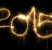 New Year 2015 formed from sparking digits over black background